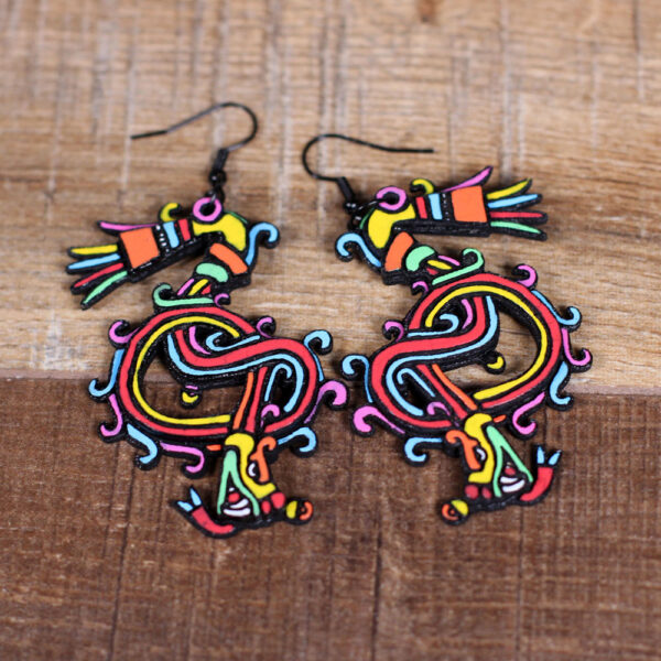 Laser cut wood earrings of Quetzalcoatl (feathered serpent).