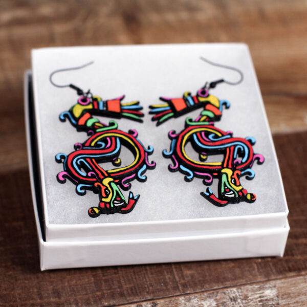 Laser cut wood earrings of Quetzalcoatl (feathered serpent).